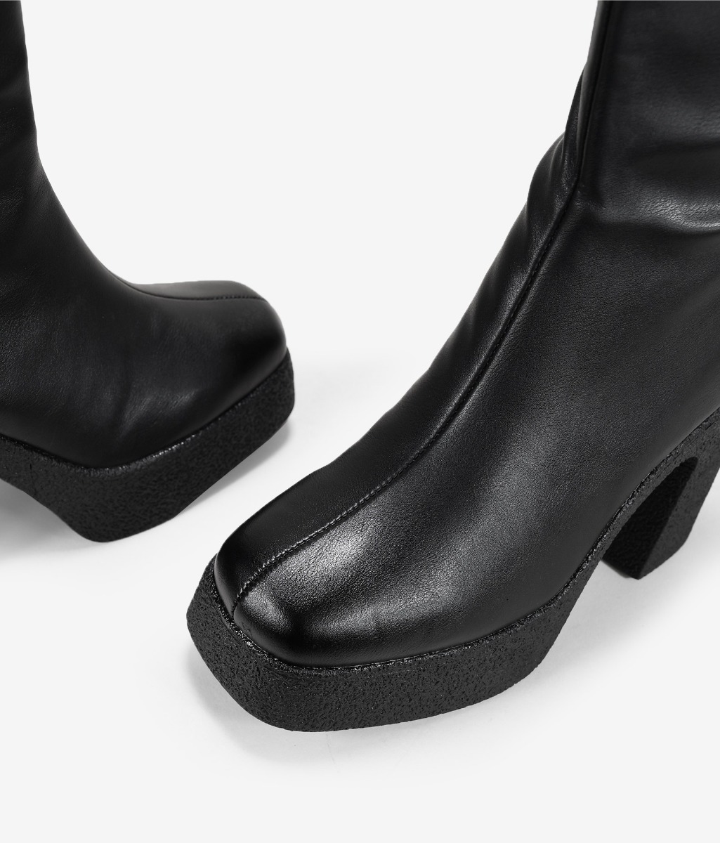 Botas altas negras con tacón y plataforma