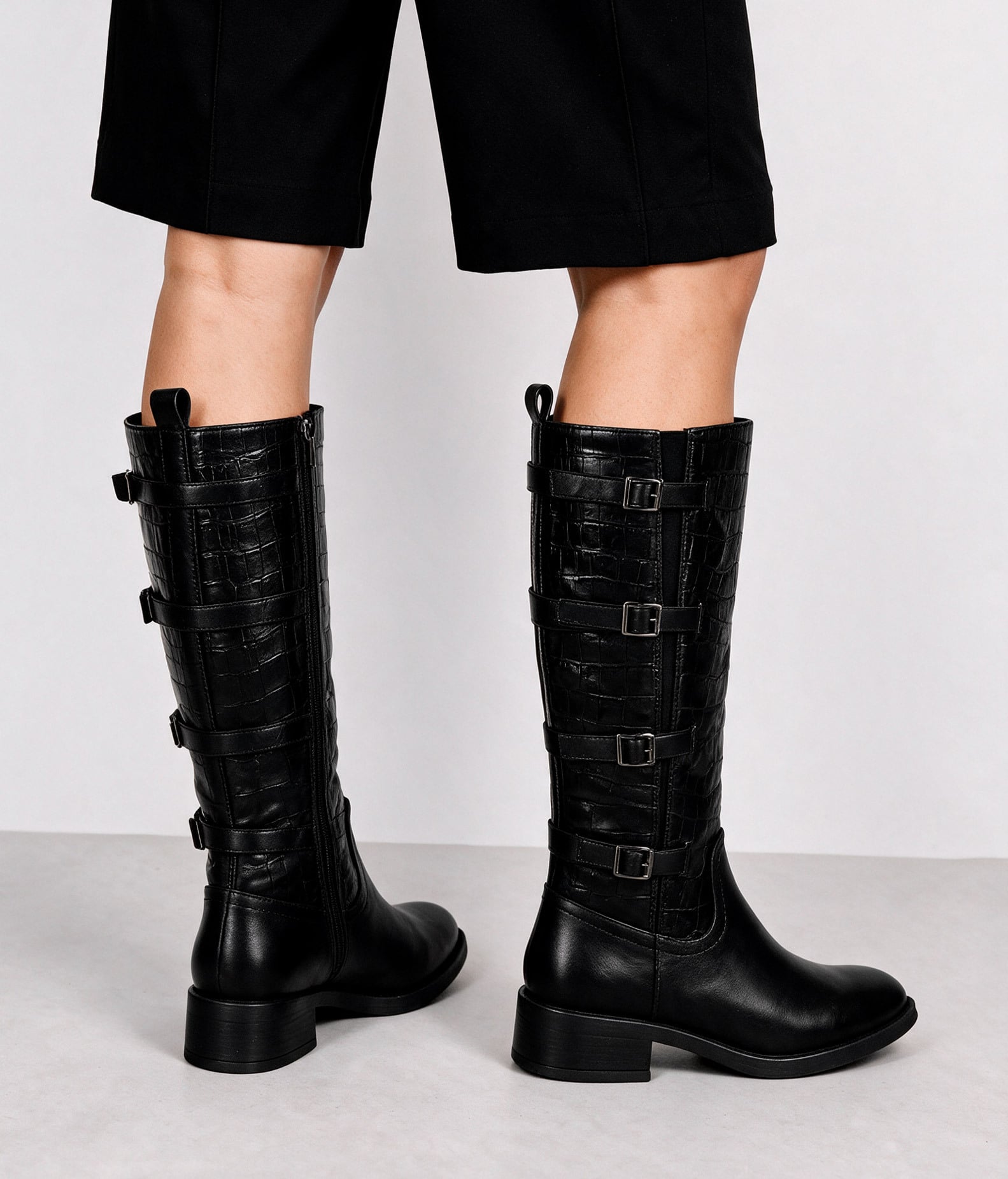 Black high boots with buckles