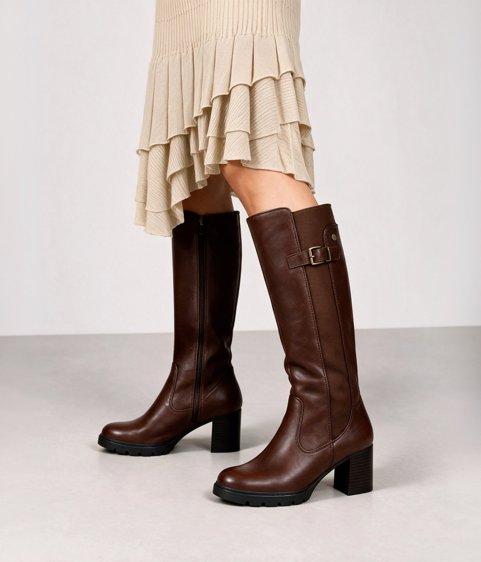 Brown knee-high boots with heel and elastic
