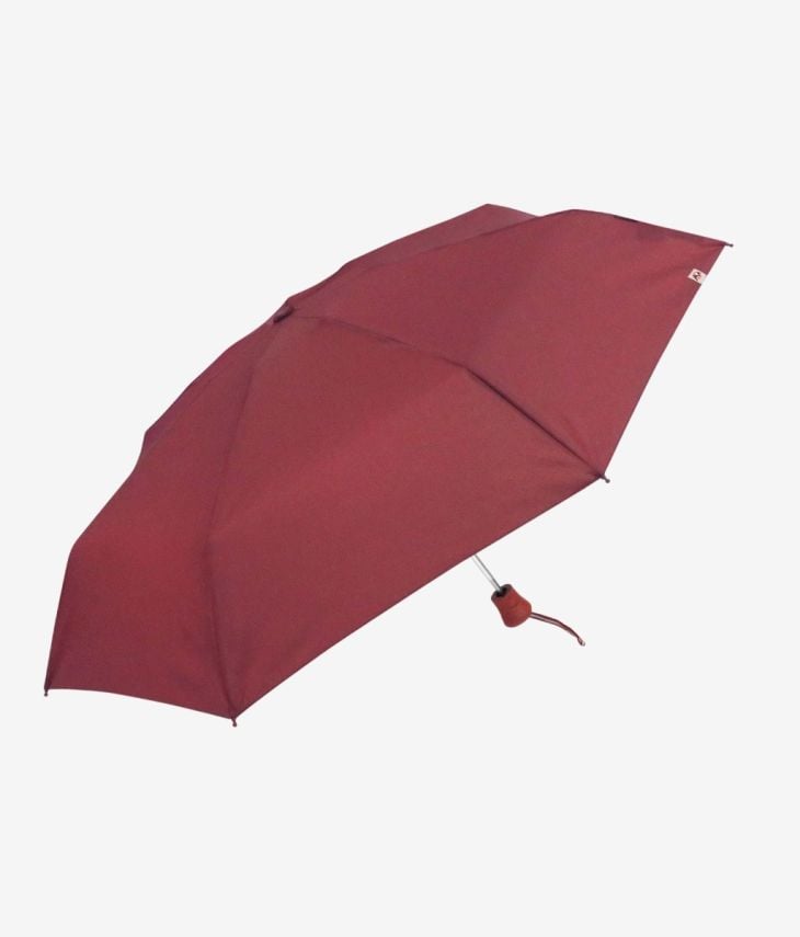 Roter Regenschirm