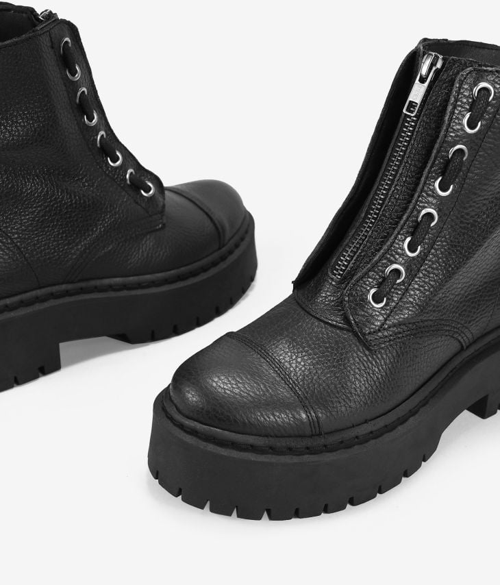 Black boots in embossed leather