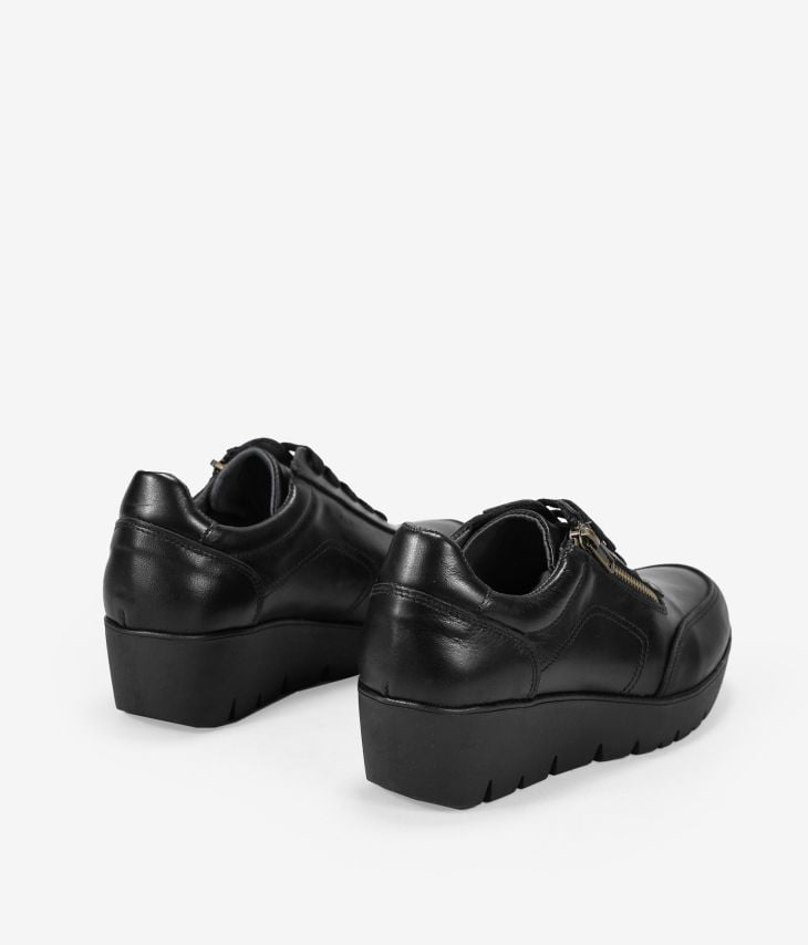 Chaussures compensées en cuir noir