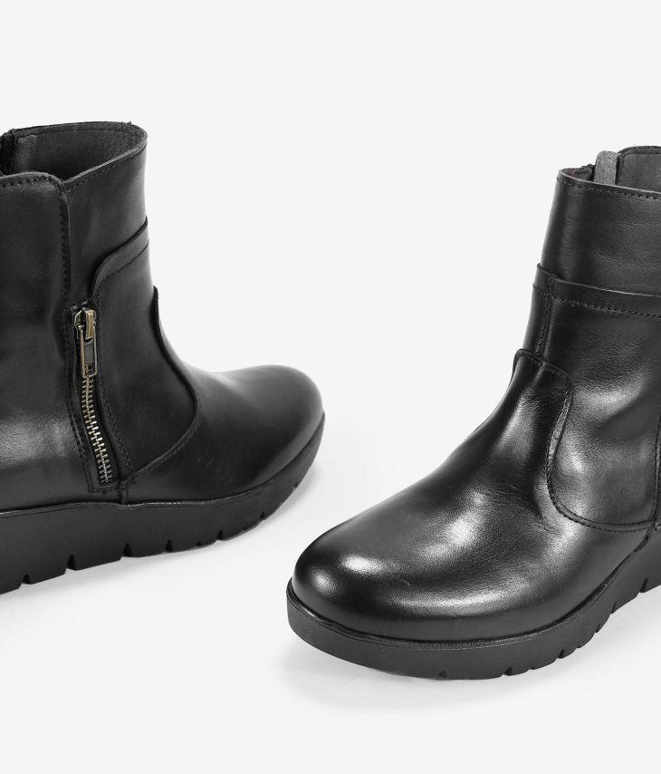 Black leather wedge ankle boots