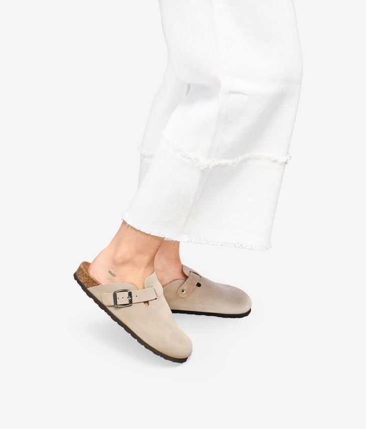 Beige leather clogs with buckle and cork sole