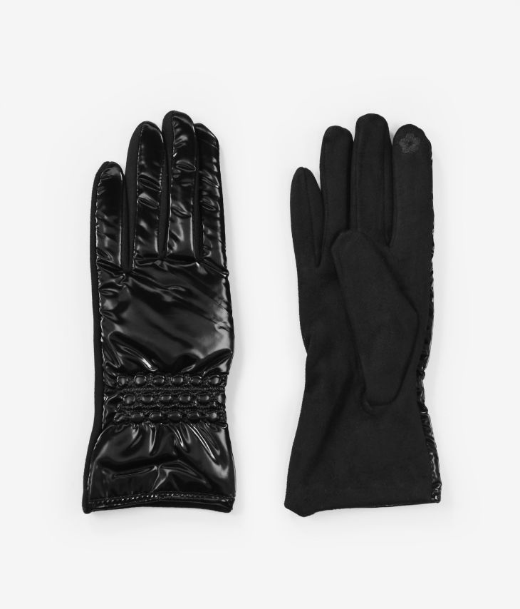 Glänzend schwarz gepolsterte Handschuhe