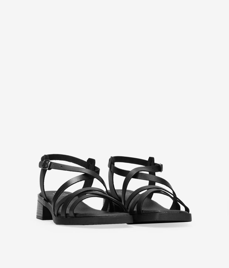 Black leather sandals with low heel