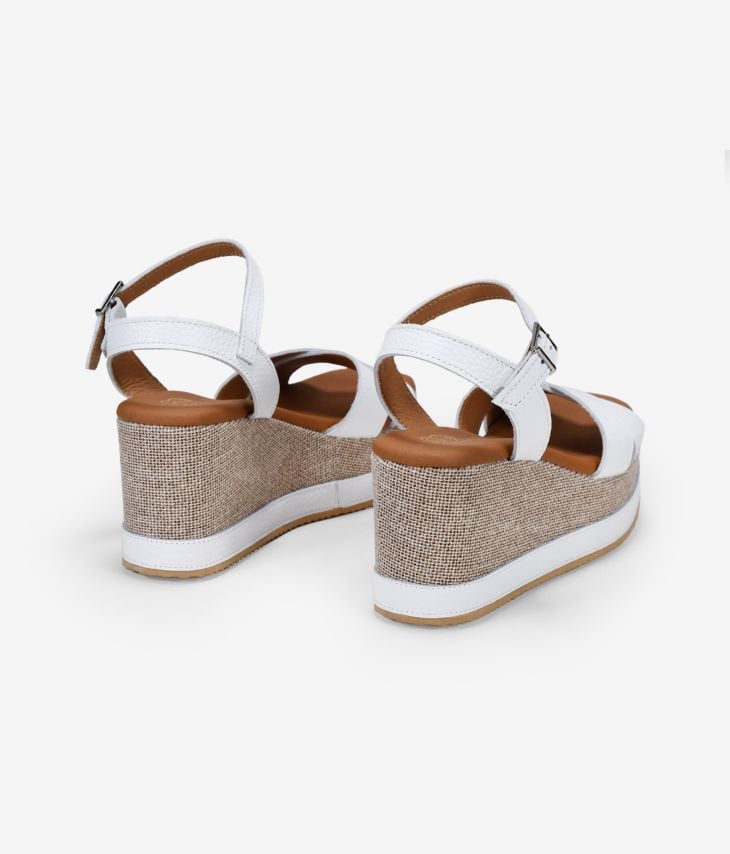 Sandales en cuir blanc avec coin et plateforme 