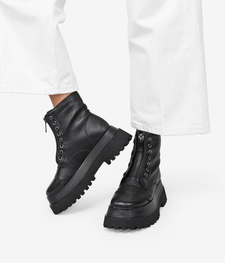 Black military boots with track sole