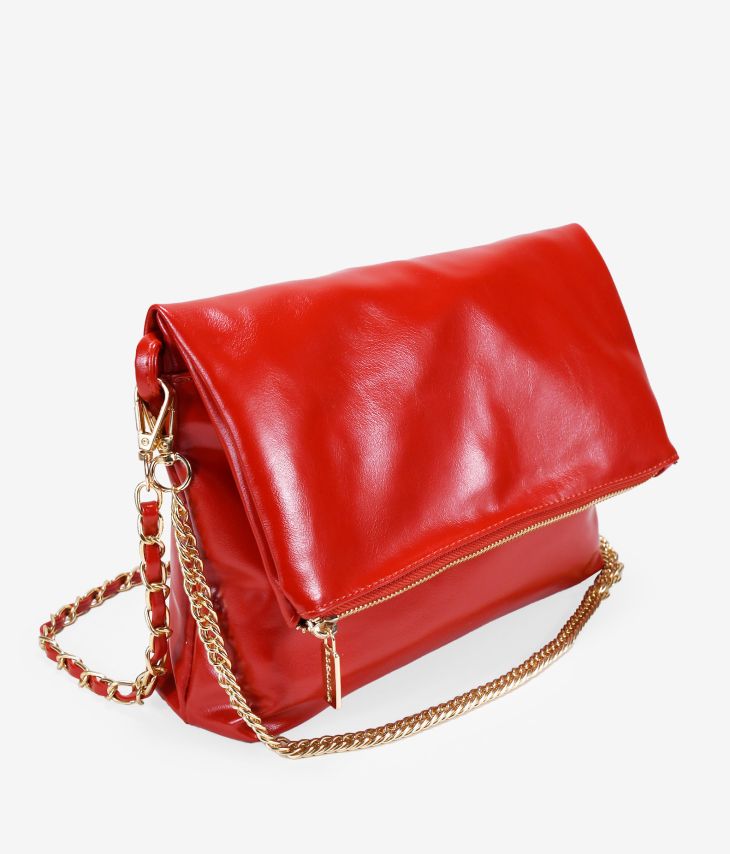 Red shoulder bag with flap and chain