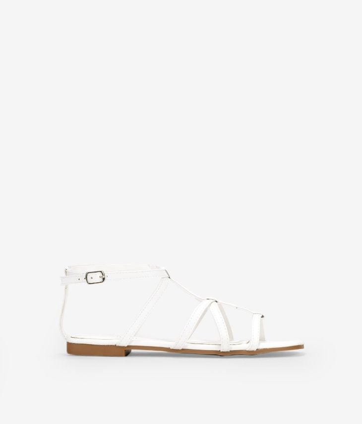 Flat white sandals with straps