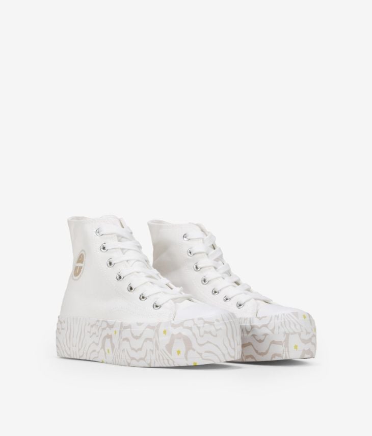 White low-top sneakers with print