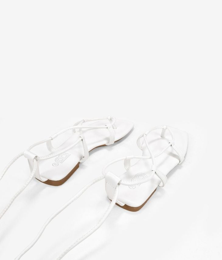 Sandalias blancas planas con cordones