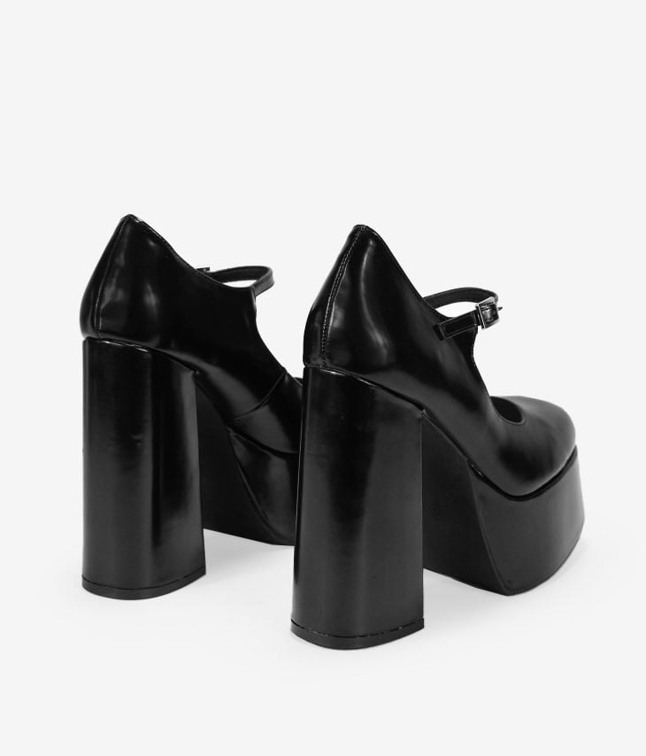 Zapatos negros tacón XXL y plataforma