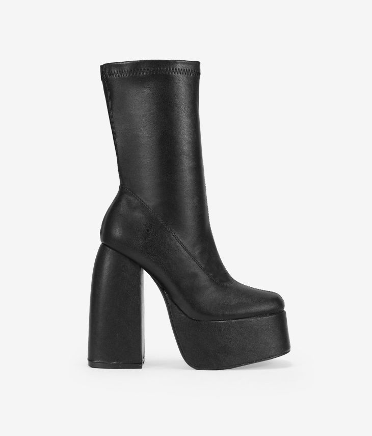 Black ankle boots with XXL heel