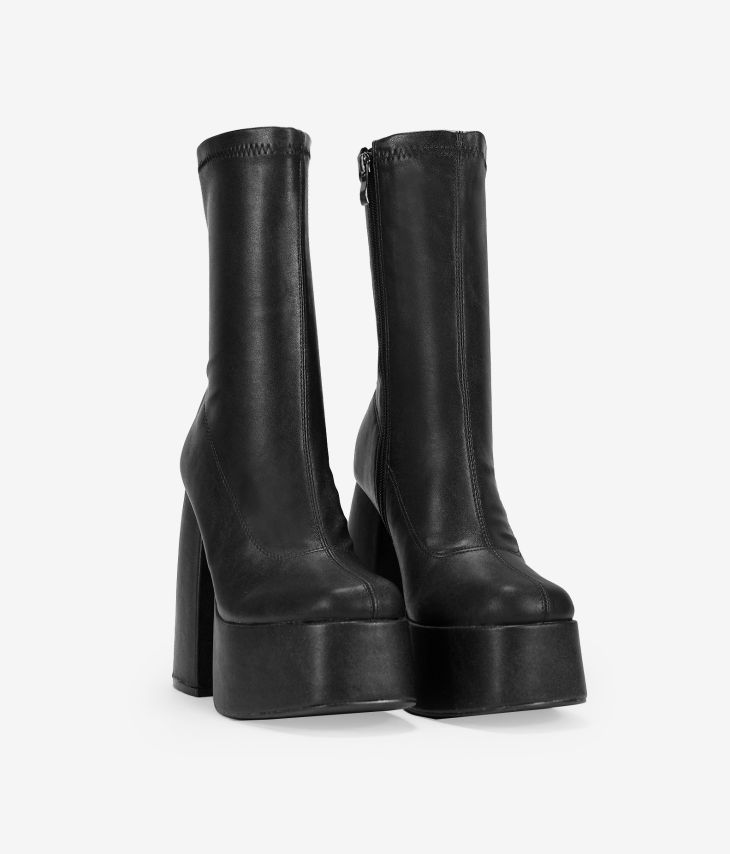 Black ankle boots with XXL heel