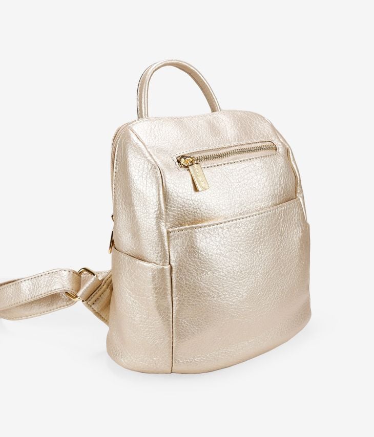 Golden backpack with zippers