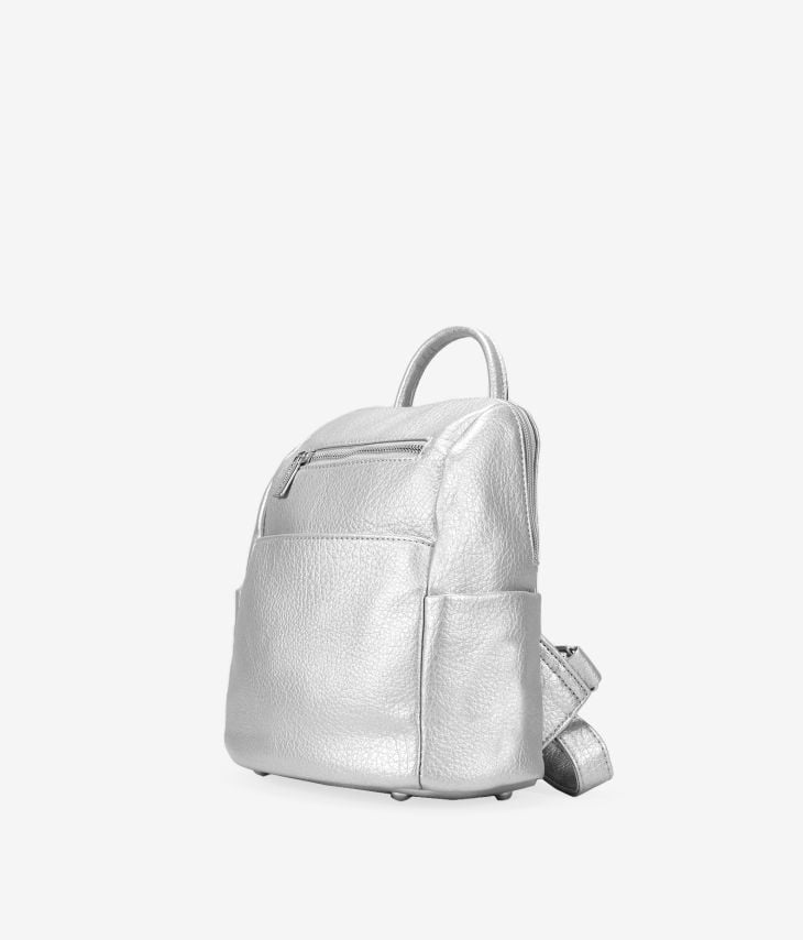 Silver backpack with zippers