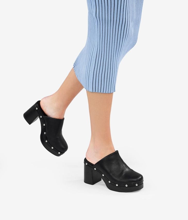 Black heeled clogs with studs