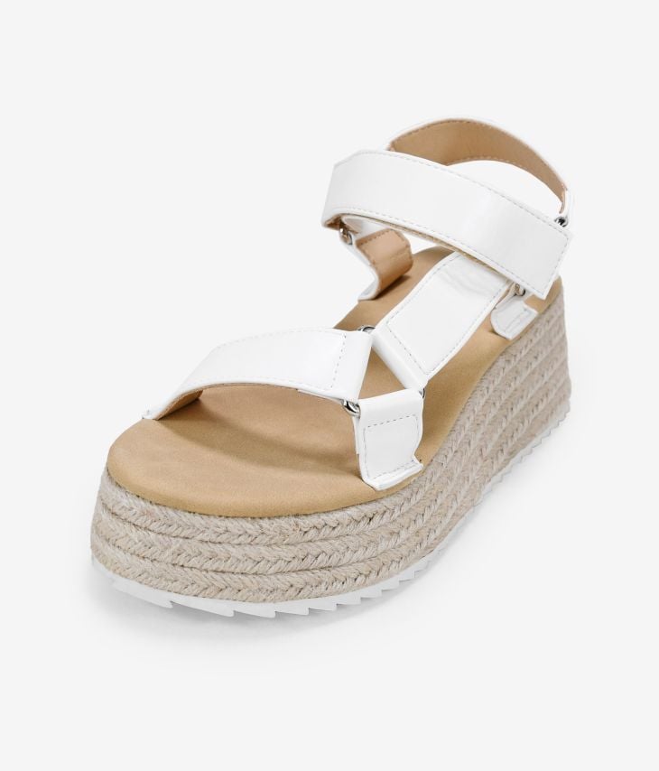 White sandals with esparto platform
