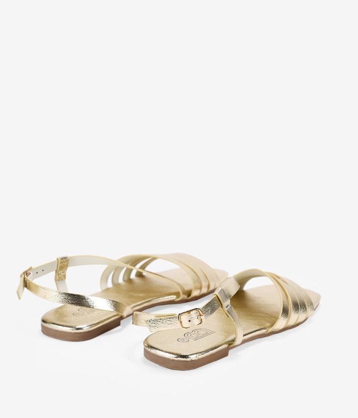 Flache goldene Sandalen mit Schnalle