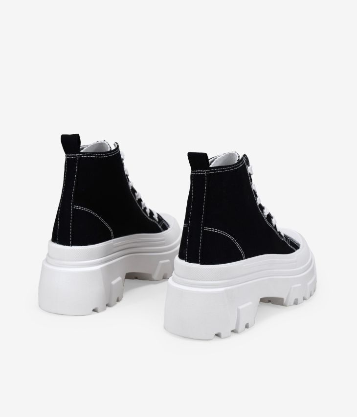 Black high-top sneakers with platform