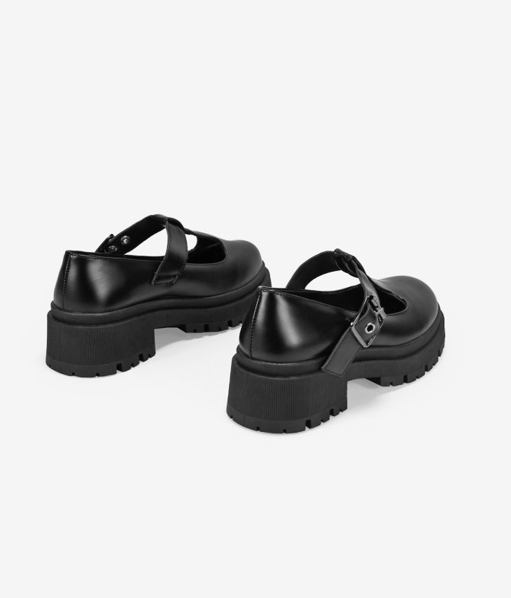Zapatos negros con hebilla y suela track 