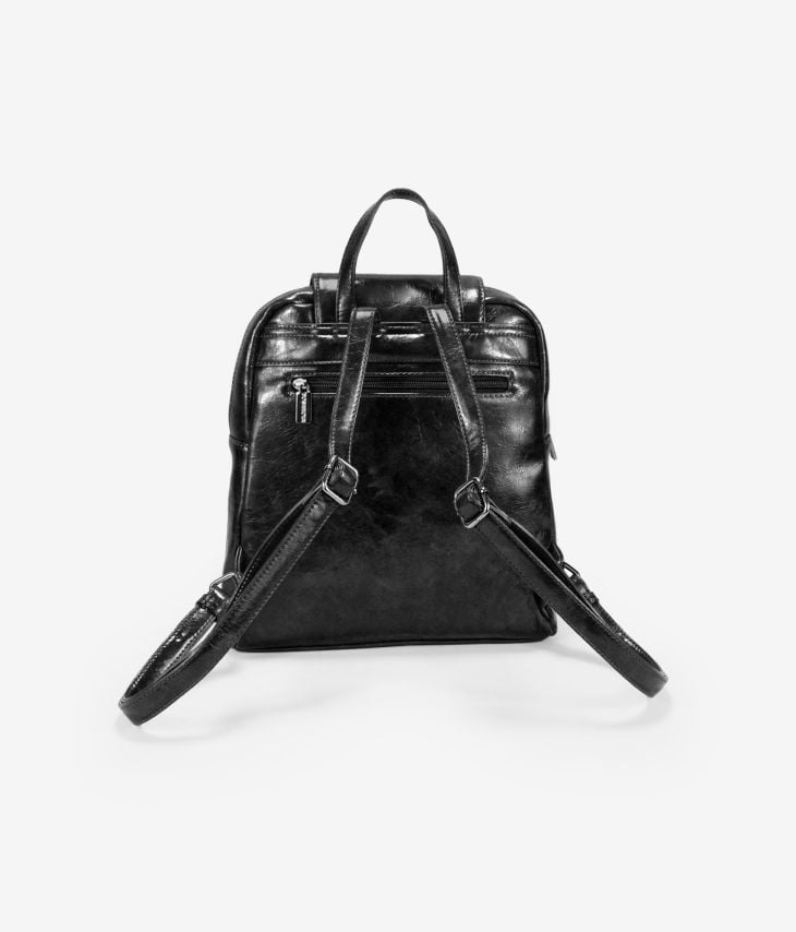 Black backpack with flap and zipper