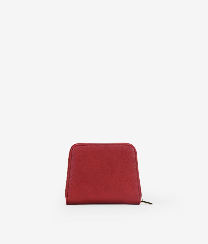 Bolsa vermelha com tachas e zíper