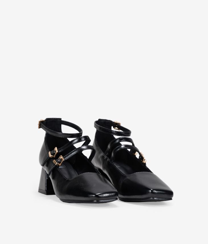 Schwarze Schuhe mit Riemchen und Absatz