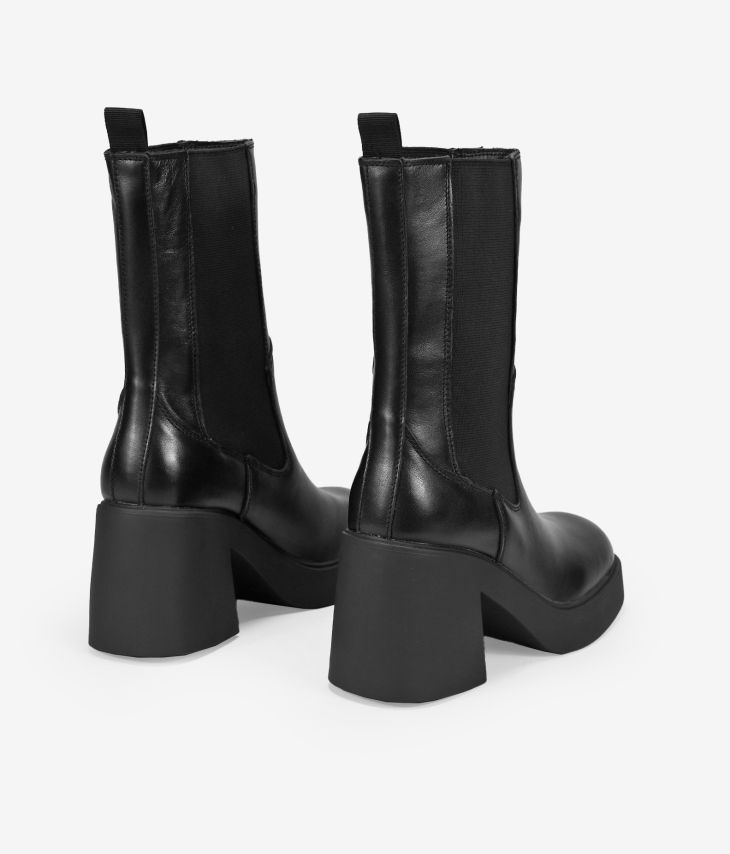Black leather boots with elastics