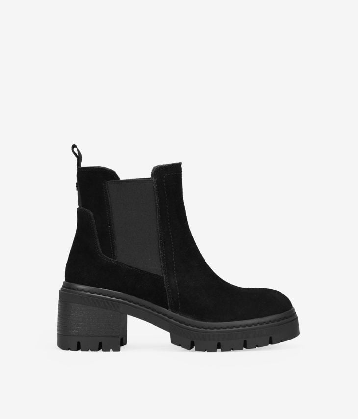 Black leather ankle boots with elastics