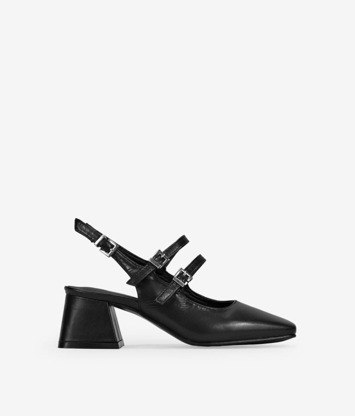 Schwarze Schuhe mit doppeltem Riemen und Absatz