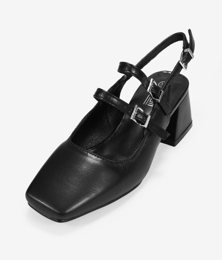 Schwarze Schuhe mit doppeltem Riemen und Absatz