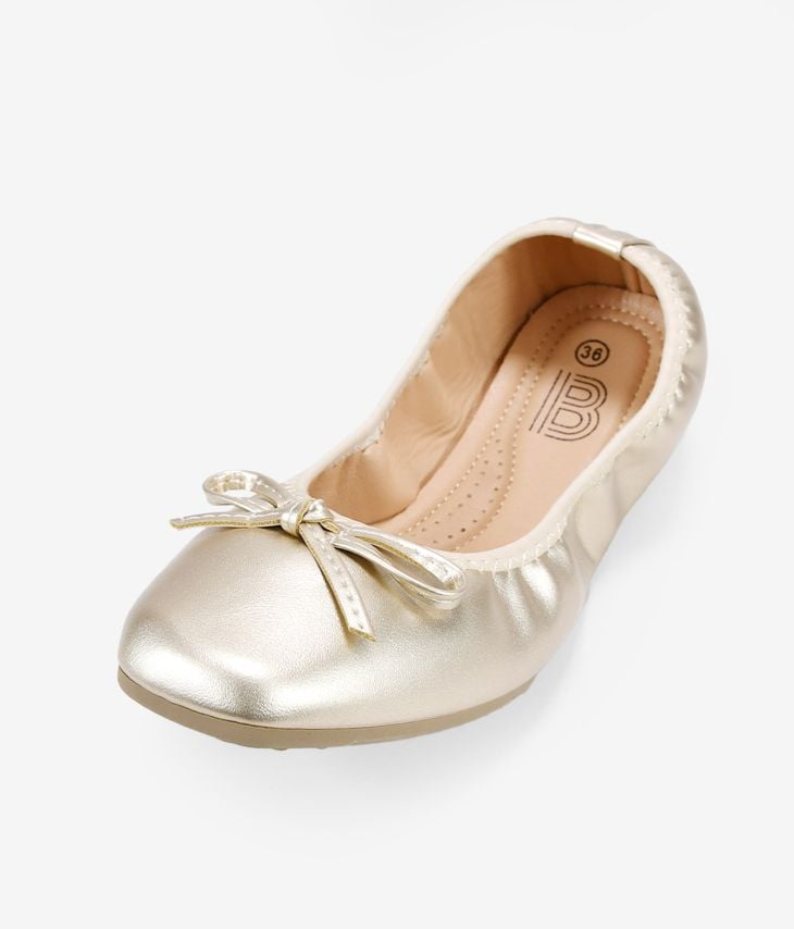 Gold flat ballerinas with bow
