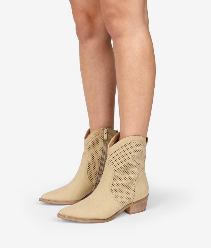 Beige cowboy ankle boots with openwork