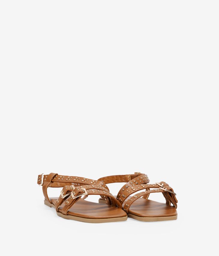 Brown flat sandals with studs and buckle