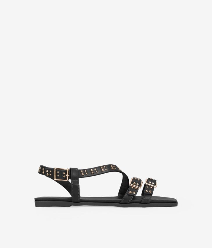 Black flat sandals with studs and buckle