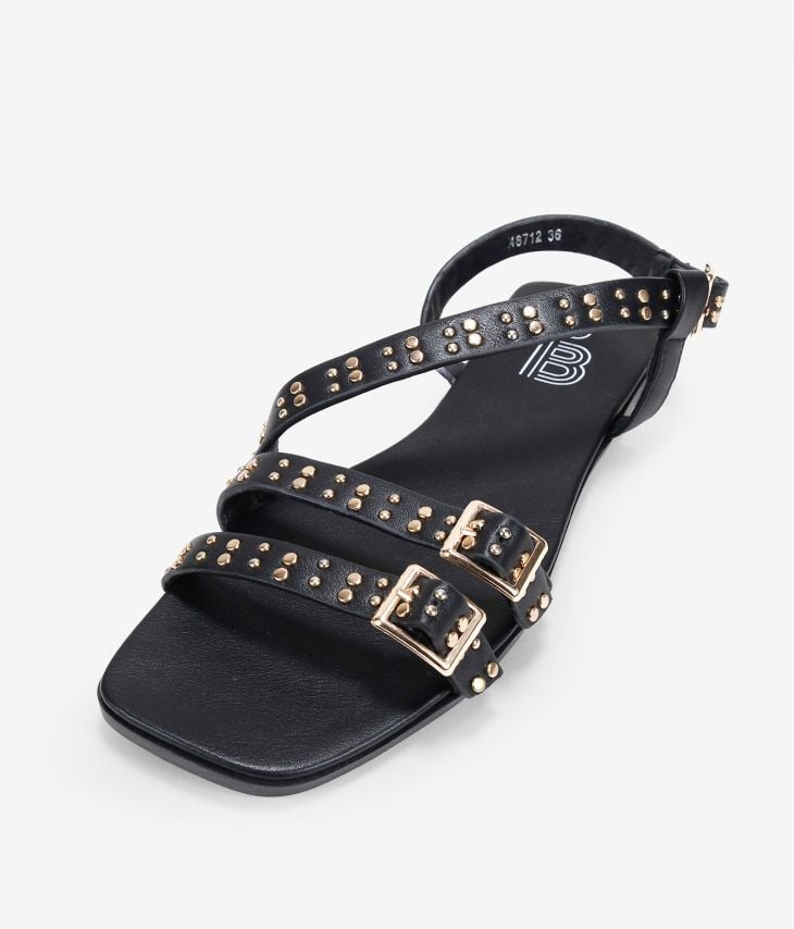 Black flat sandals with studs and buckle