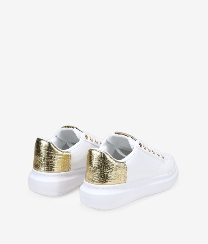 White and gold women's sneakers with platform
