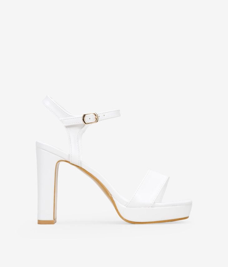 White heeled sandals with bracelet and buckle