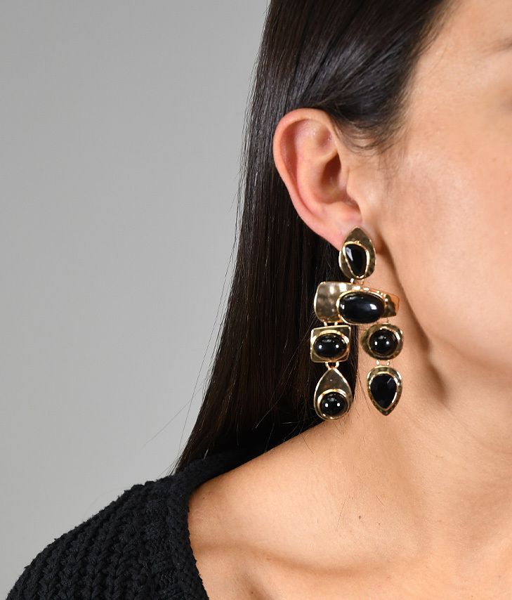 Gold metal earrings with black stones