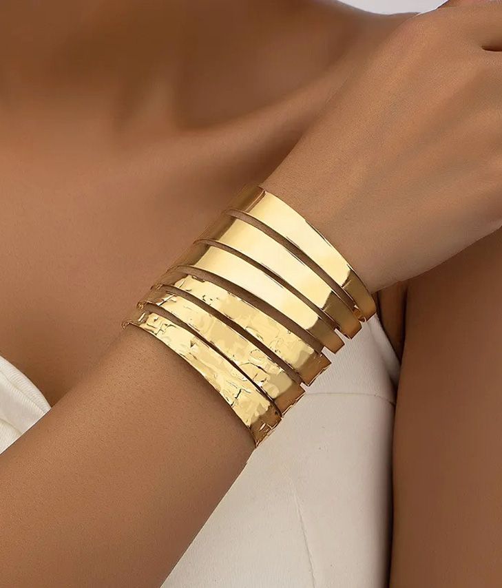 Golden bracelet with openings